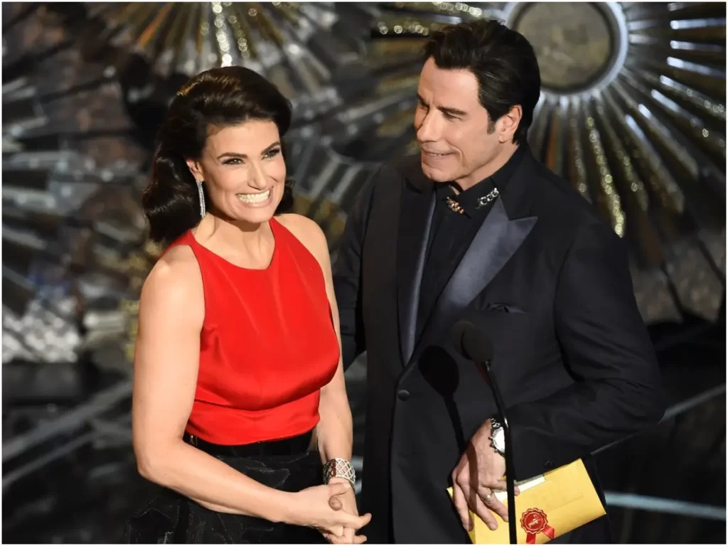 Travolta Mispronounced Menzel's Name At Oscars, Joked About It Later.